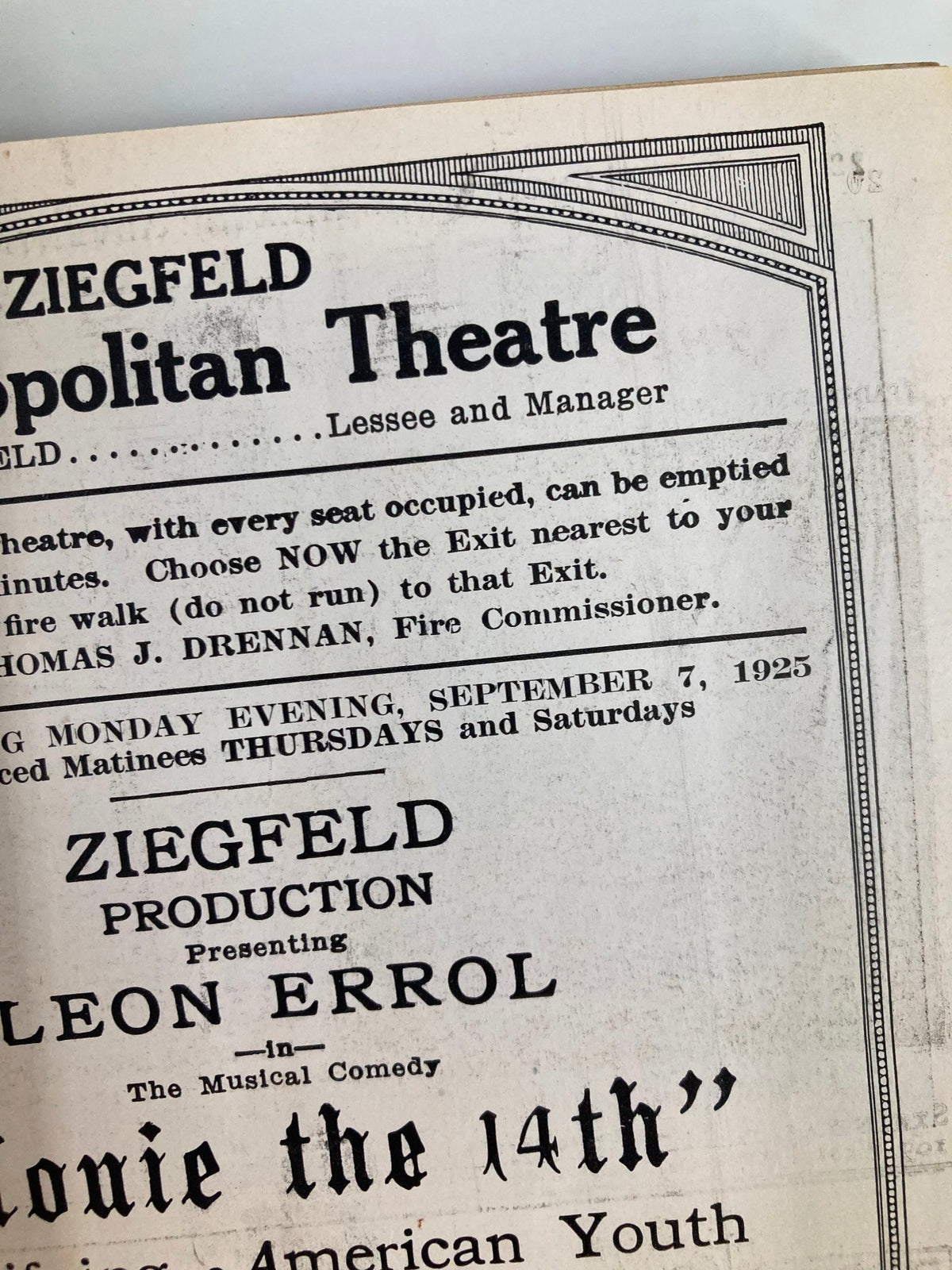 Close-up view of the 1925 Ziegfeld Cosmopolitan Theatre program highlighting Leon Errol in Lonie The 14th, including important information on fire safety and theatre manager details.