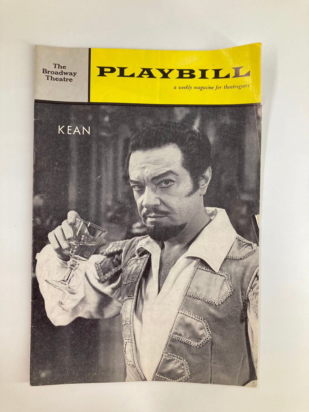 1962 Playbill for The Broadway Theatre featuring Alfred Drake in the play Kean, showing the cover with title and dramatic performance image.