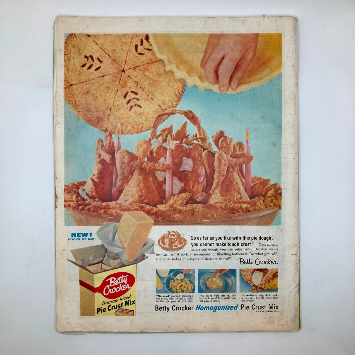 Vintage advertisement for Betty Crocker Homogenized Pie Crust Mix featuring a whimsical pie creation, perfect for a nostalgic collection. Saturday Evening Post Magazine October 8 1955 Football Stadium - John Clymer.