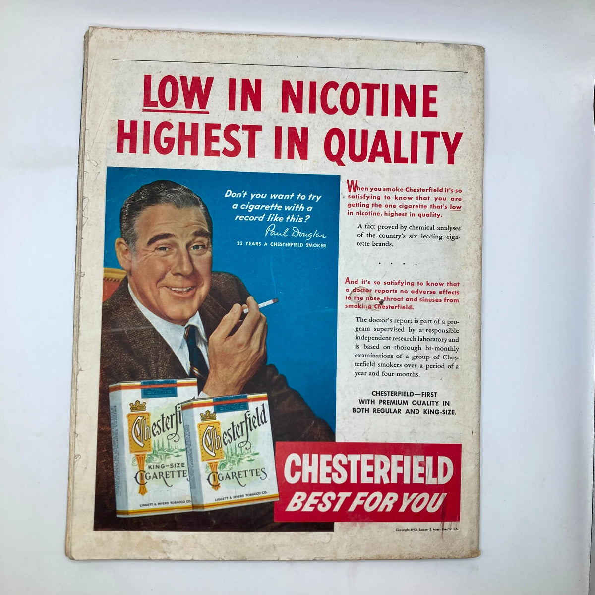 Back cover of the Saturday Evening Post Magazine October 24, 1953, displaying an advertisement for Chesterfield cigarettes with a smiling man, emphasizing product quality and marketing style from the era.