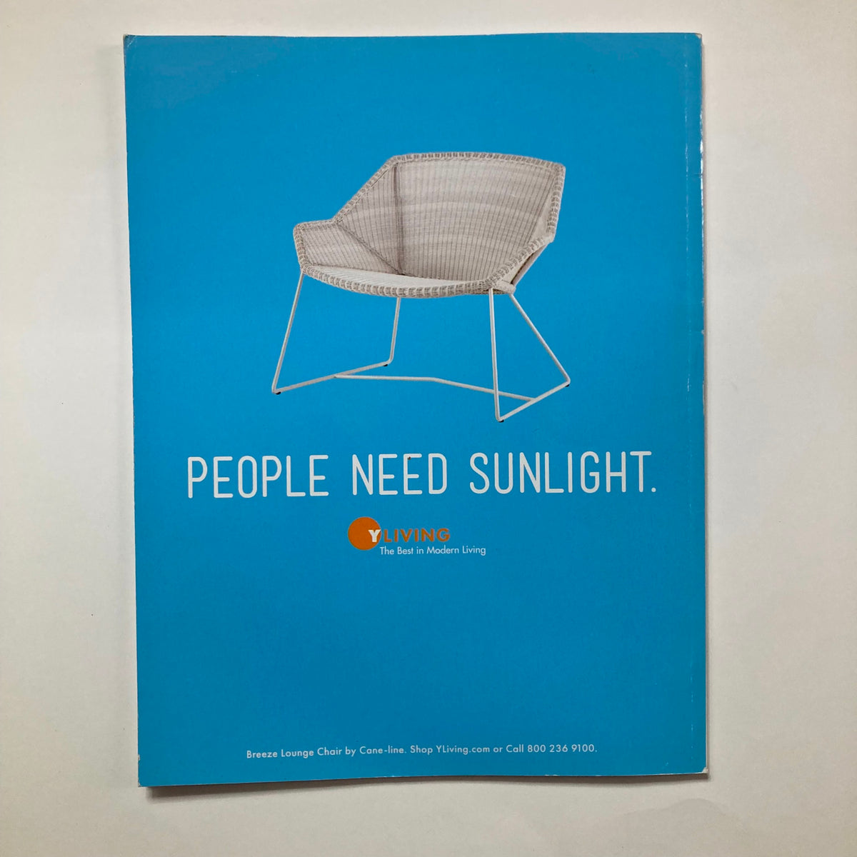 Back cover of Atomic Ranch Magazine Summer 2017 featuring a modern lounge chair design with the text 'People Need Sunlight.'