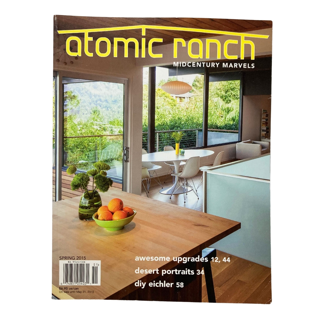 Cover of Atomic Ranch Magazine Spring 2015 featuring a modern mid-century kitchen with sliding glass doors and a wooden dining table.