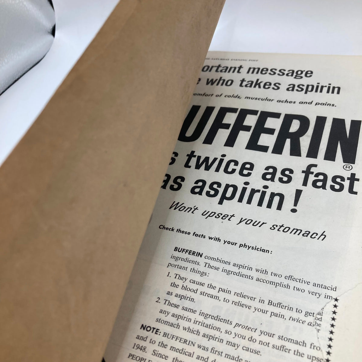 Advertisement for Bufferin pain reliever featuring bold text stating it acts twice as fast as aspirin, from the Saturday Evening Post Magazine February 27 1954.