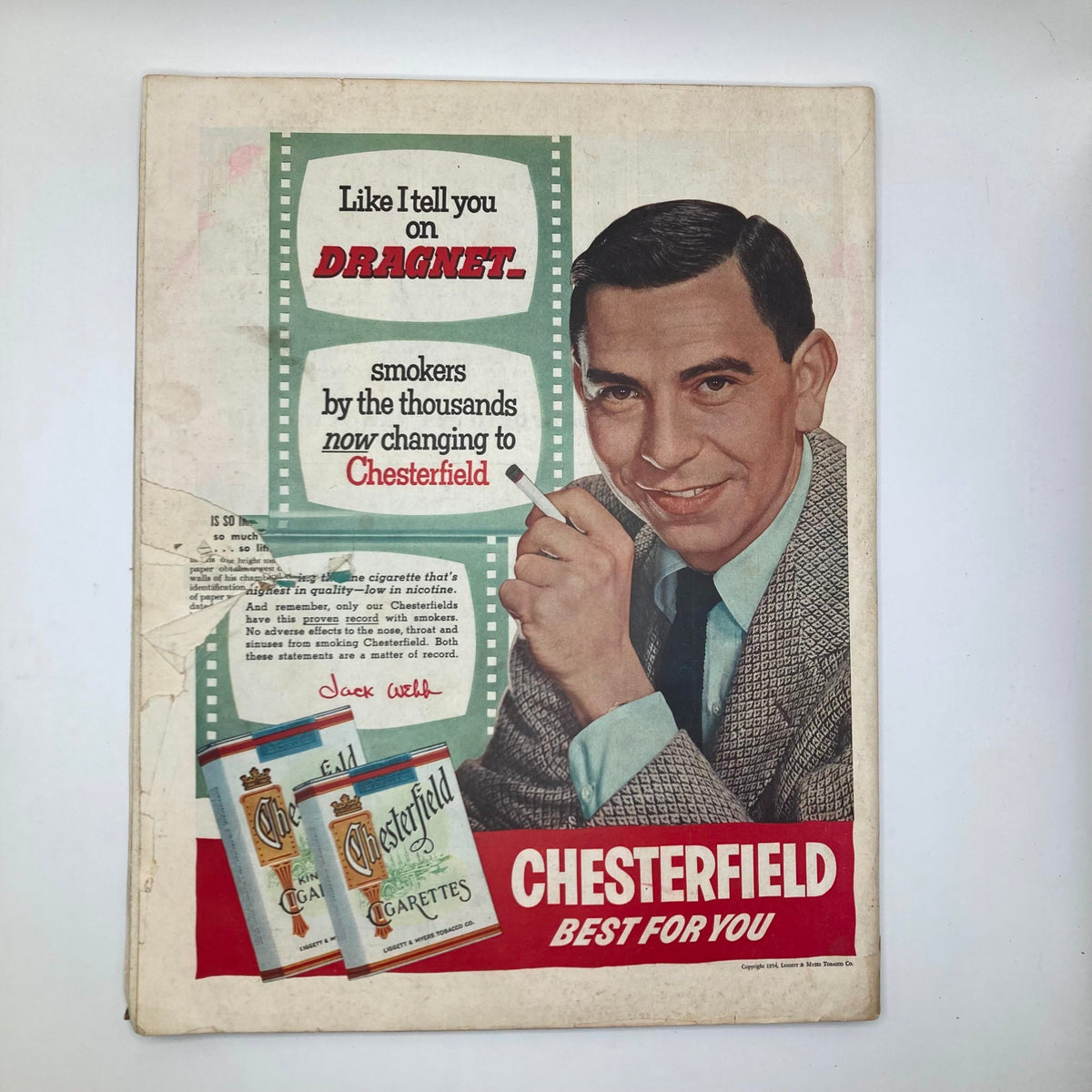 Advertisement page in Saturday Evening Post Magazine February 27 1954 for Chesterfield cigarettes featuring Jack Webb, promoting the brand's appeal to smokers.