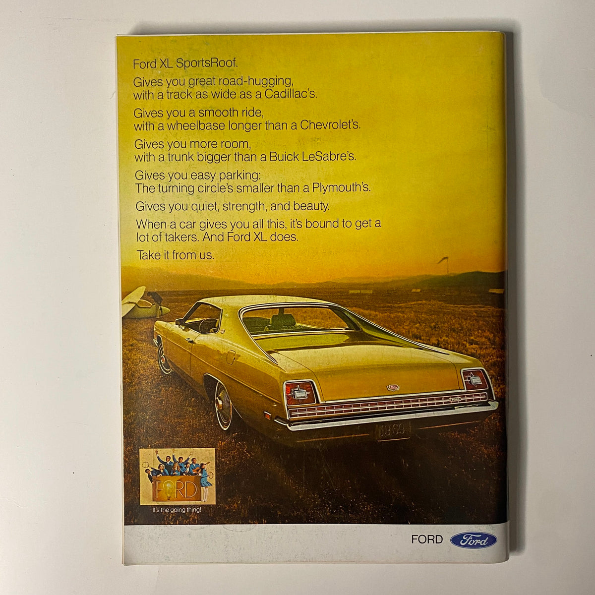 Vintage advertisement for the Ford XL SportsRoof, promoting its features such as spaciousness, smooth ride, and easy parking, set against a scenic background. This ad is featured in Playboy Magazine, April 1969 issue with Playmate Lorna Hopper.