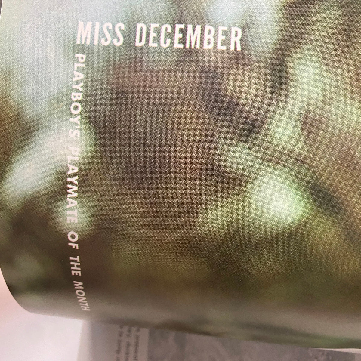 Playboy Magazine December 1964 featuring Jo Collins as Playmate of the Month. The image showcases the text 'MISS DECEMBER' and highlights Jo Collins as Playboy's Playmate.