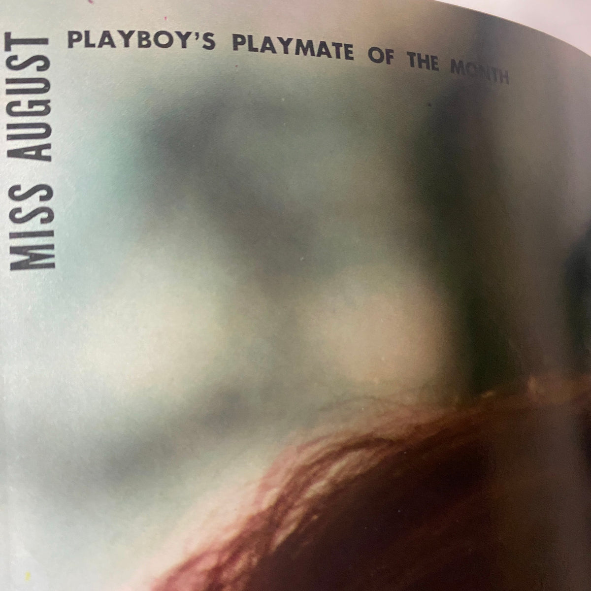 An inner page of Playboy Magazine August 1968 highlighting 'Miss August' as Playboy's Playmate of the Month, emphasizing the magazine's vintage appeal.