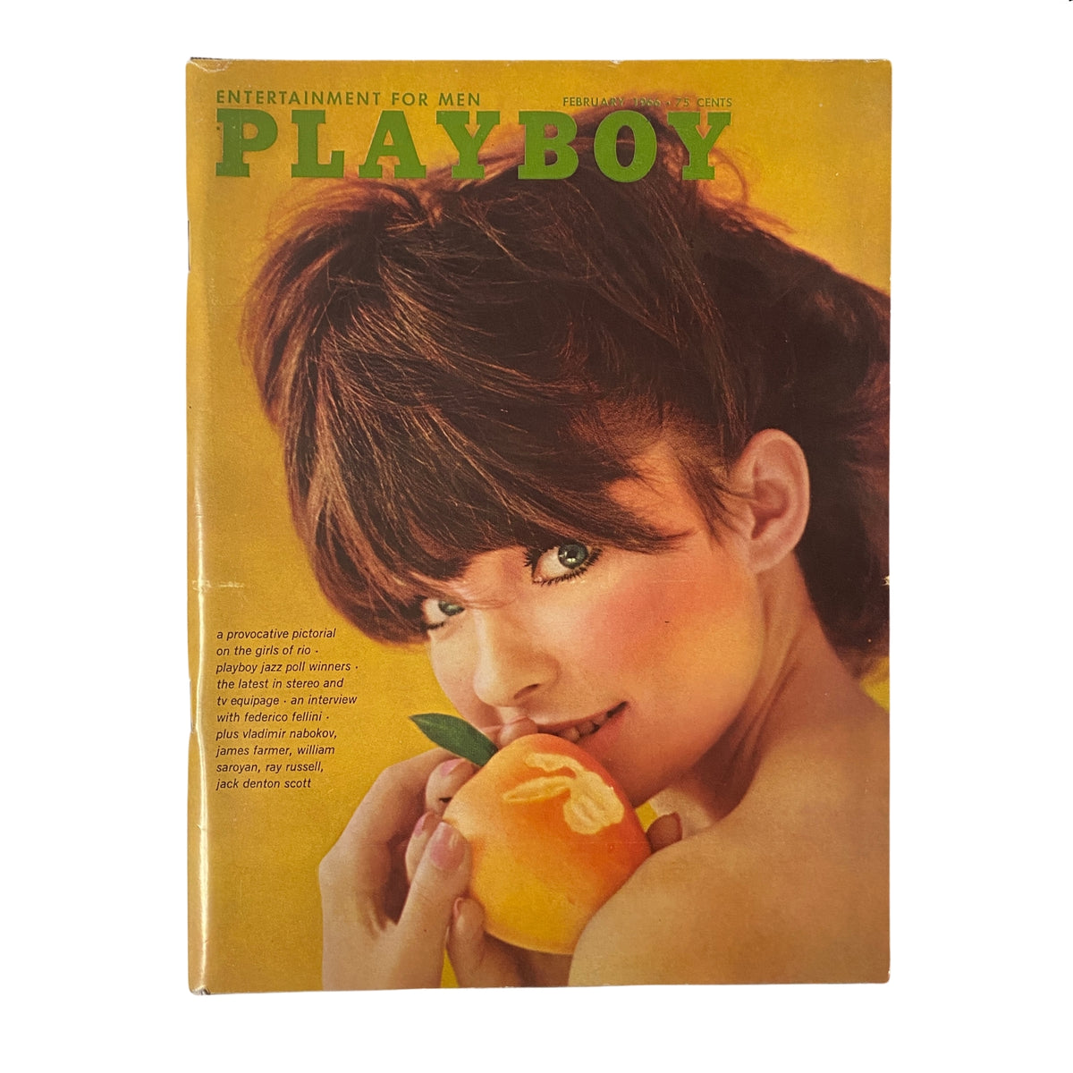 Cover of Playboy Magazine February 1966 featuring Playmate Melinda Windsor, showcasing her engaging look while holding an orange, highlighting the magazine's vintage style and cultural significance.