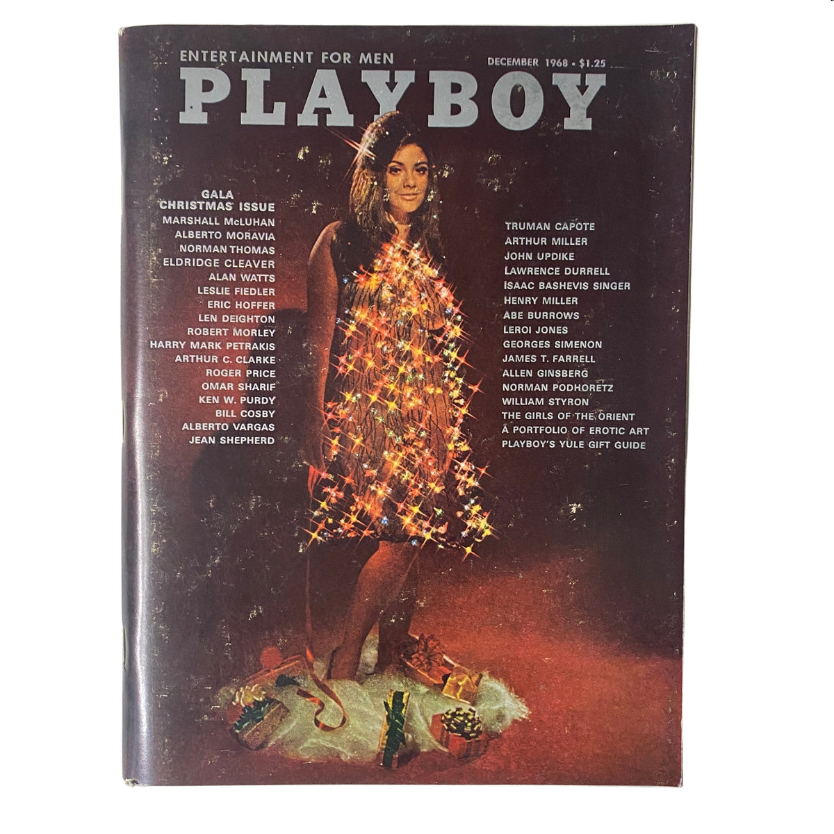 Playboy Magazine December 1968 cover featuring Cynthia Myers as Playmate of the Month, adorned with Christmas lights.