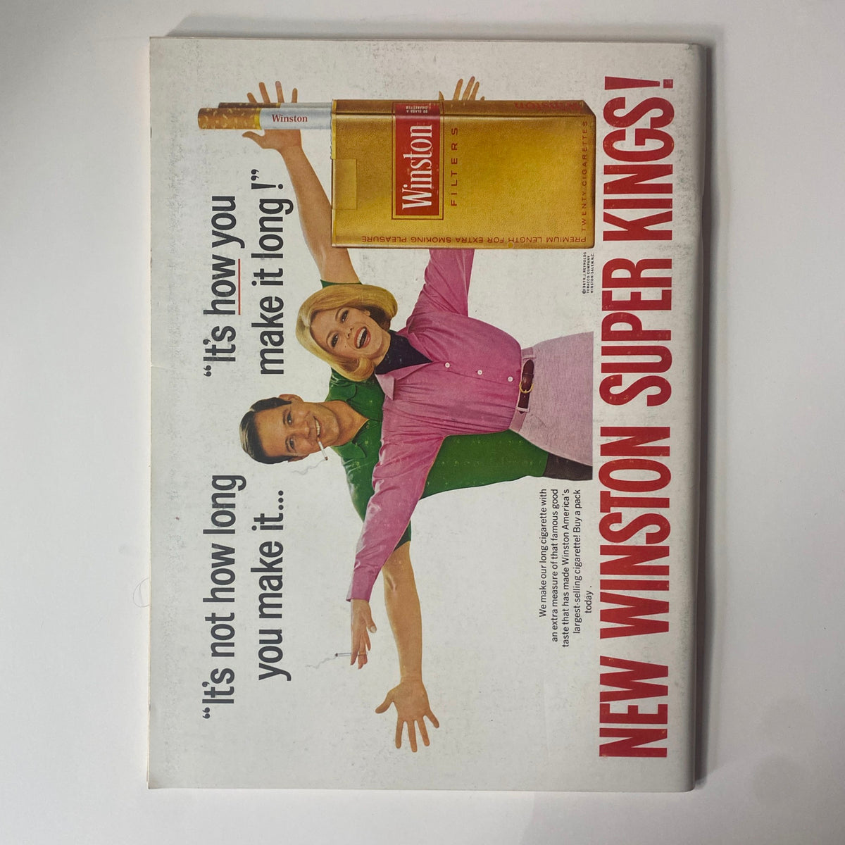 Back cover of Playboy Magazine August 1967 featuring a vintage advertisement for Winston cigarettes with a couple promoting 'Winston Super Kings!' and the slogan 'It's how long you make it'.