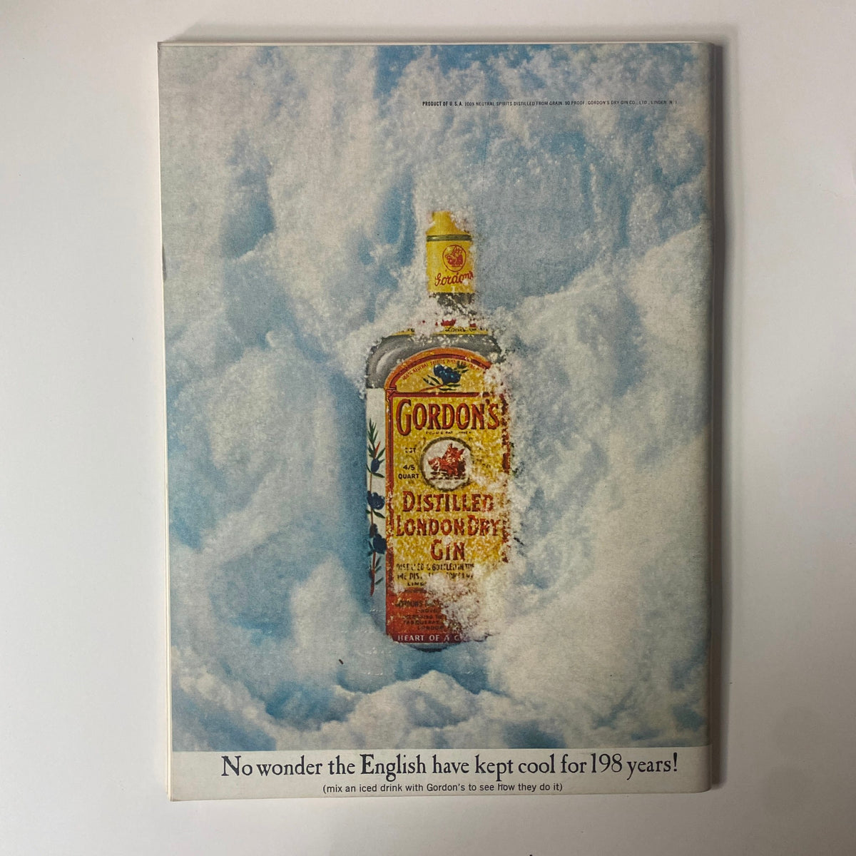 Advertisement page from Playboy Magazine July 1967 showcasing a Gordon's Distilled London Dry Gin bottle in a snowy background.