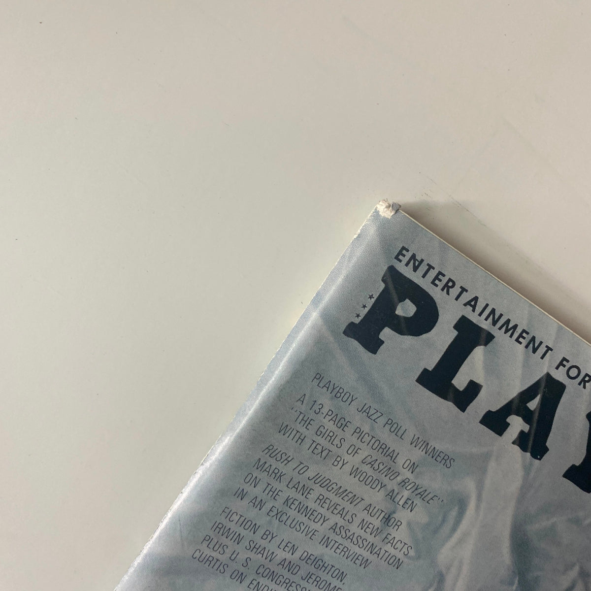 Close-up of the top corner of Playboy Magazine February 1967, emphasizing its vintage style and iconic branding.