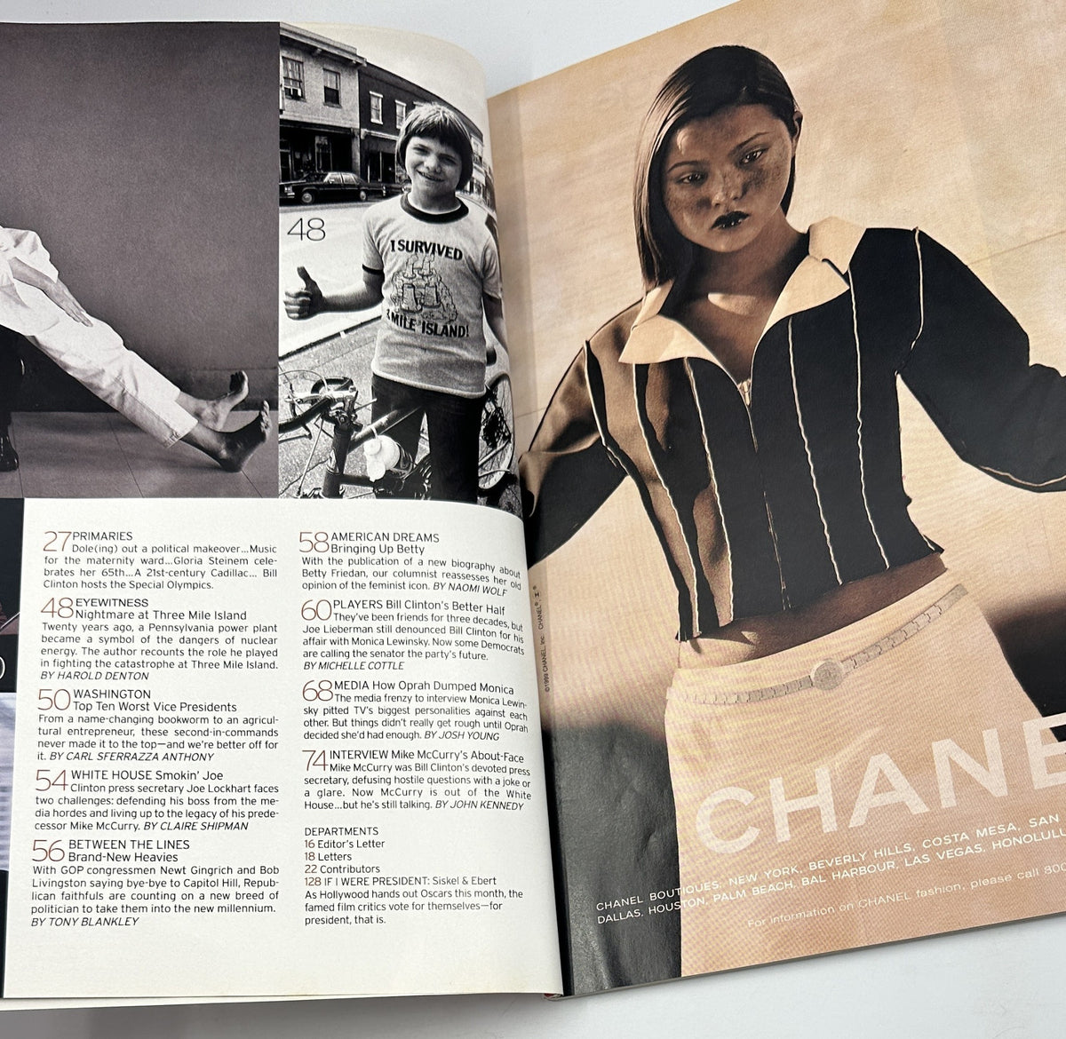 Another inside spread from George Magazine March 1999, presenting features such as 'Primaries' and 'American Dreams', with an artistic photo of a model dressed in Chanel.