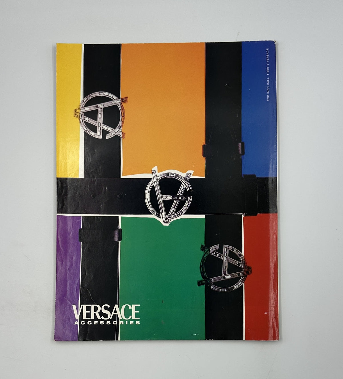 The back cover of George Magazine August 1998 featuring a colorful Versace accessories advertisement.
