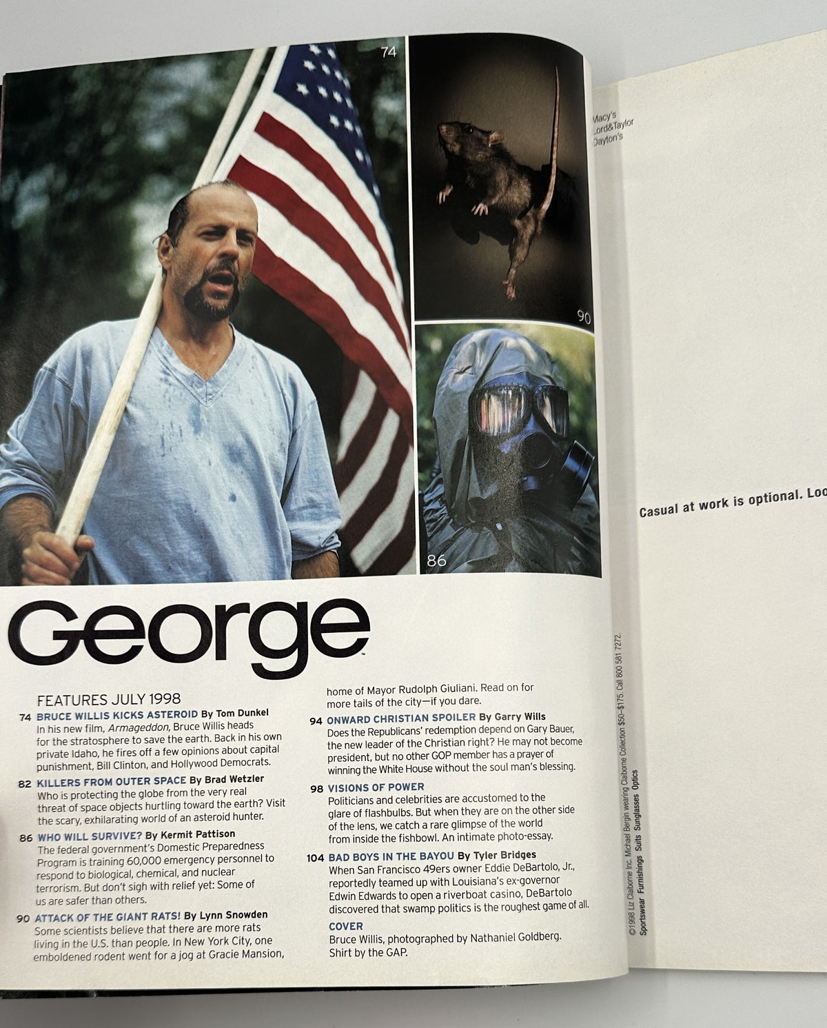 Inside spread of George Magazine July 1998 highlighting articles on Bruce Willis, asteroids, and politics. The page includes an image of Willis with an American flag and features summaries of various articles, emphasizing themes of political commentary and cultural observations.