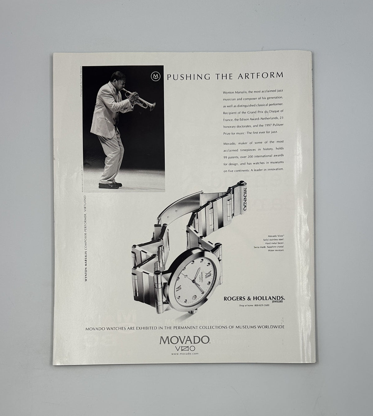 Advertisement page from George Magazine June 2000 featuring a vintage Movado watch alongside musician Wynton Marsalis.