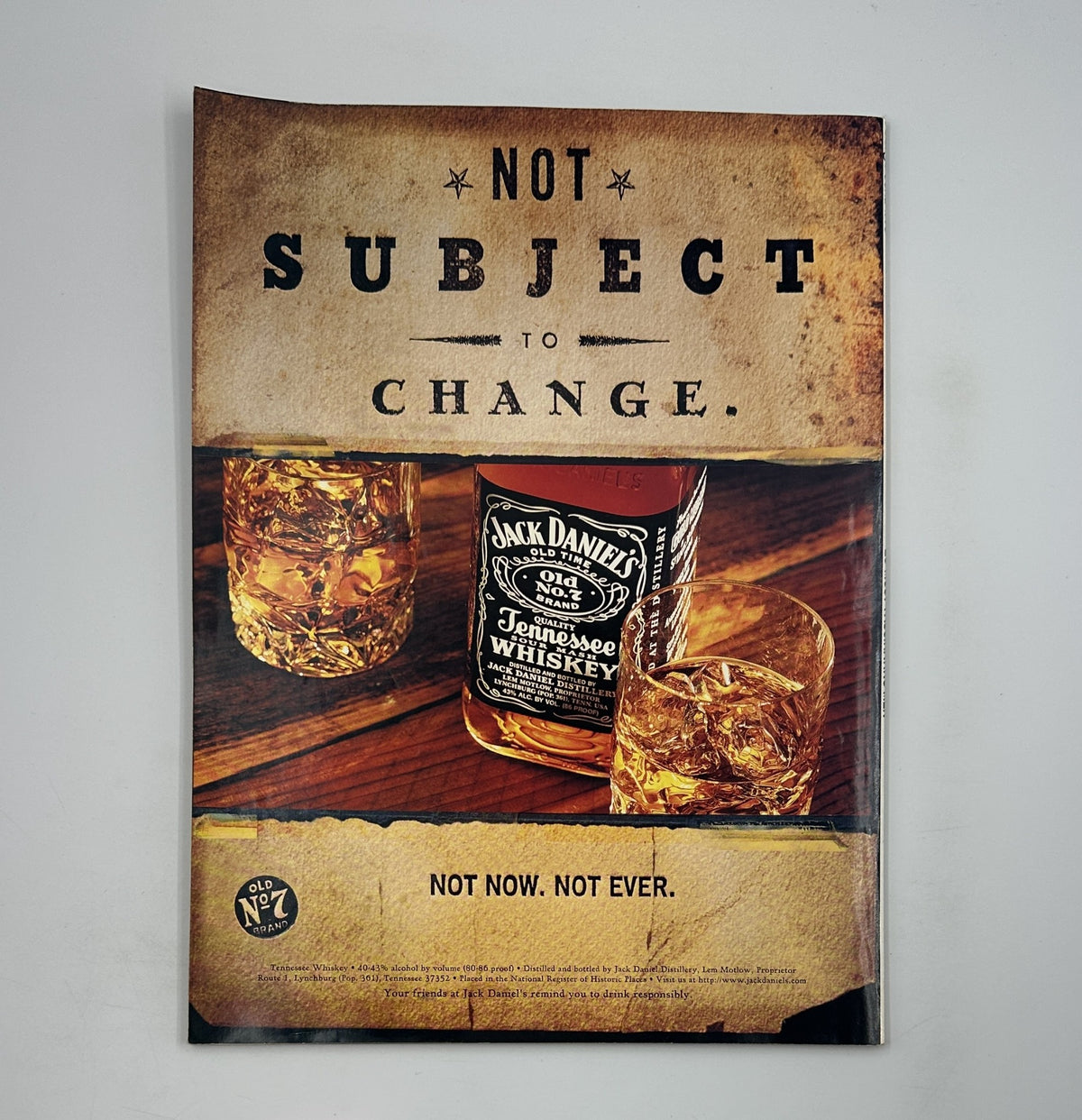 Advertisement page from George Magazine June 1998 for Jack Daniel's whiskey, featuring the message 'Not Subject to Change' with a visual of whiskey glasses.