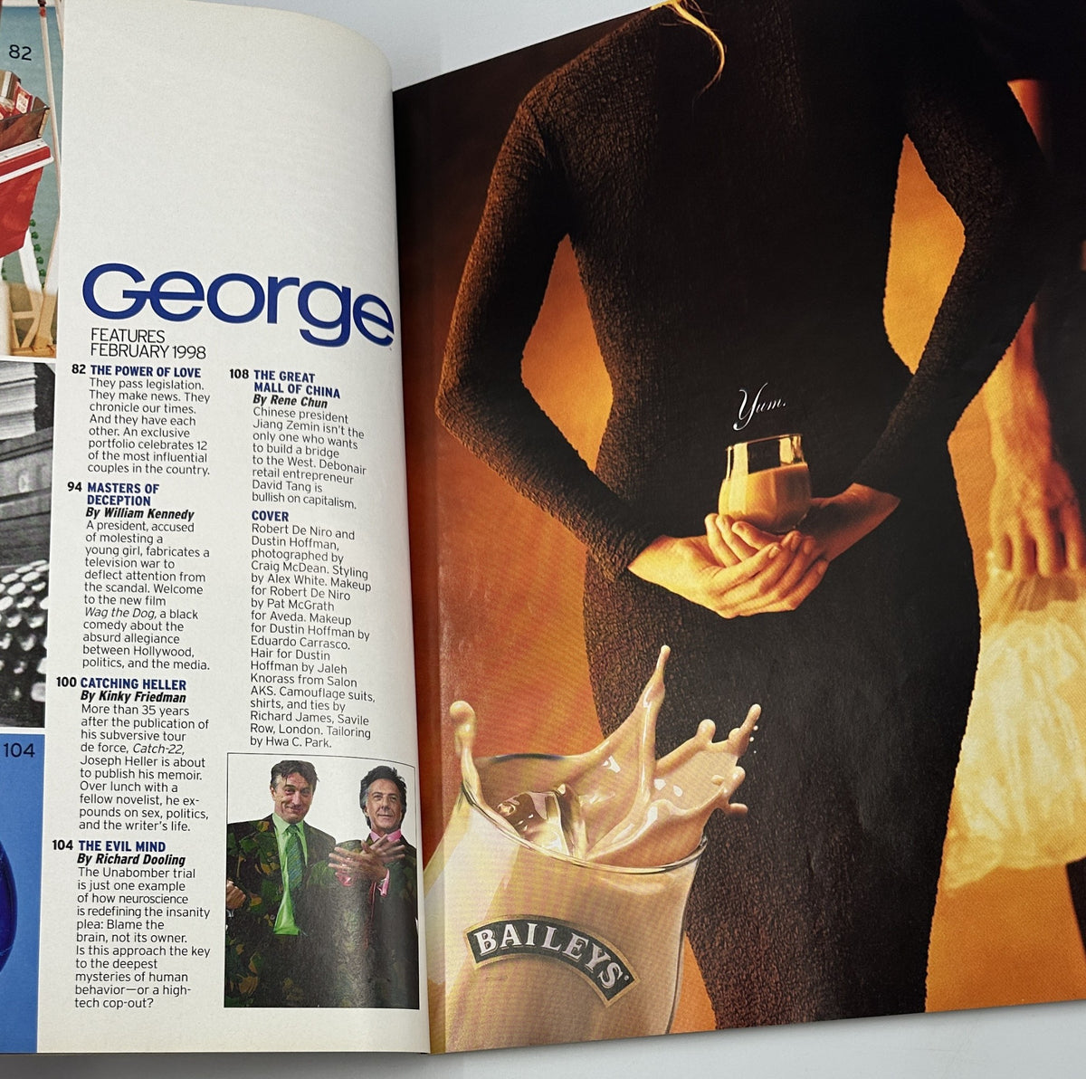 Inside page of George Magazine February 1998 showcasing the Table of Contents including features like 'The Power of Love' and 'Catching Heller', alongside a promotional advertisement for Baileys.