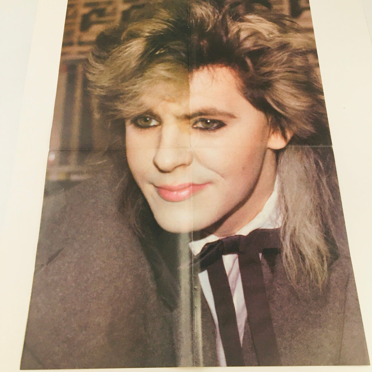 Poster from Pop Gallery Magazine #16, featuring a close-up of a Duran-Duran band member with notable '80s hairstyle and makeup, highlighting the era's iconic style.
