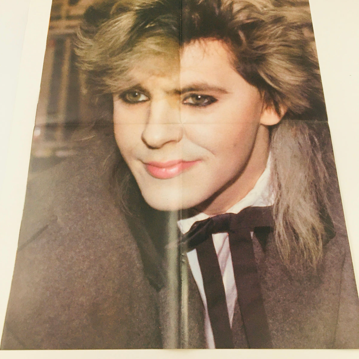 Close-up image of a portrait from the Pop Gallery Poster Magazine #13 featuring Duran Duran, showcasing vibrant 1980s glam rock style with distinctive makeup and fashion. Perfect for collectors and fans of the band.