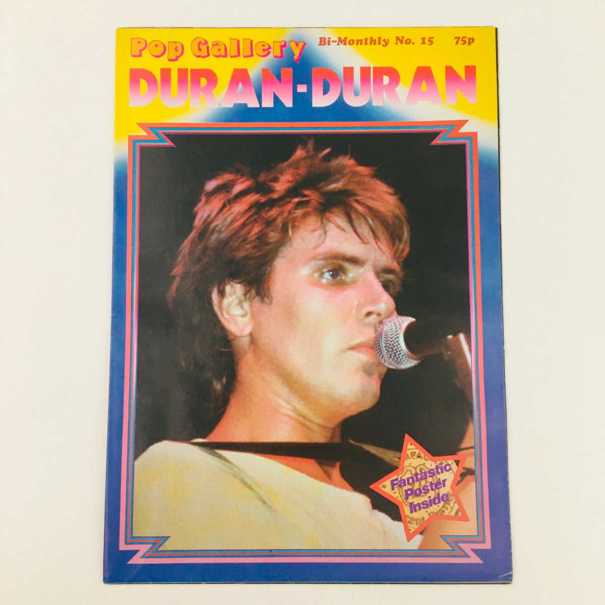 Pop Gallery Poster Magazine #15 featuring Duran Duran's Simon Le Bon on the cover. Released in the 1980s, this magazine showcases the iconic frontman with vibrant colors and a nostalgic design.