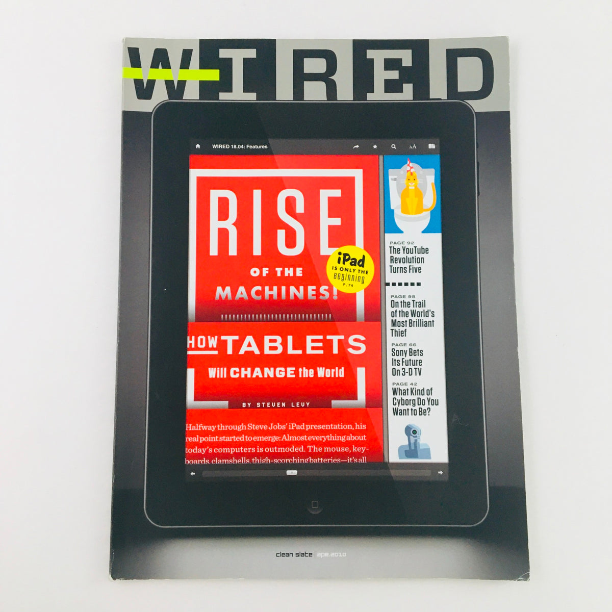 Wired Magazine April 2010 featuring the cover titled 'Rise of the Machines - How Tablets Change the World', showcasing a tablet device on a clean background, highlighting the impact of tablets on technology.