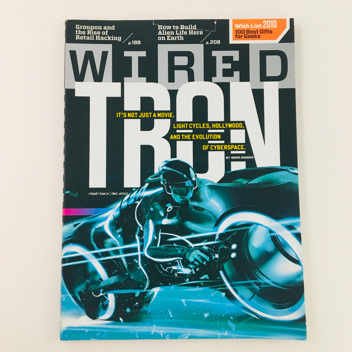Wired Magazine December 2010 cover featuring Tron, showcasing light cycles, Hollywood, and the evolution of cyberspace.