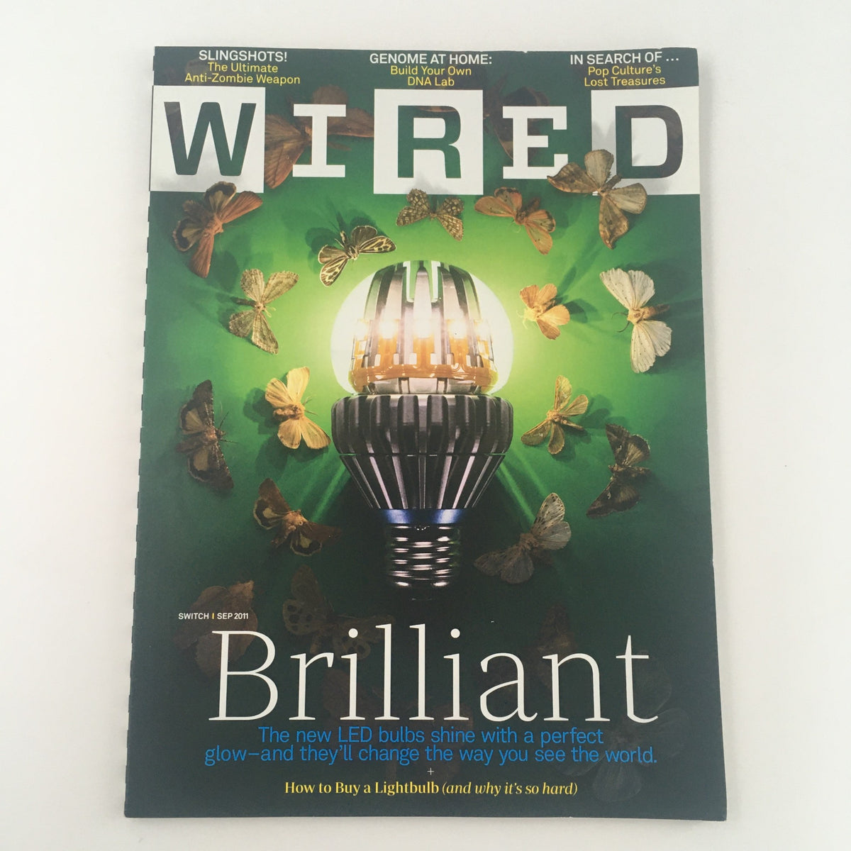 Cover of Wired Magazine September 2011: LED Bulbs Shine with a Perfect Glow, highlighting the brilliance of new lighting technology with a striking design featuring butterflies and a glowing LED bulb.