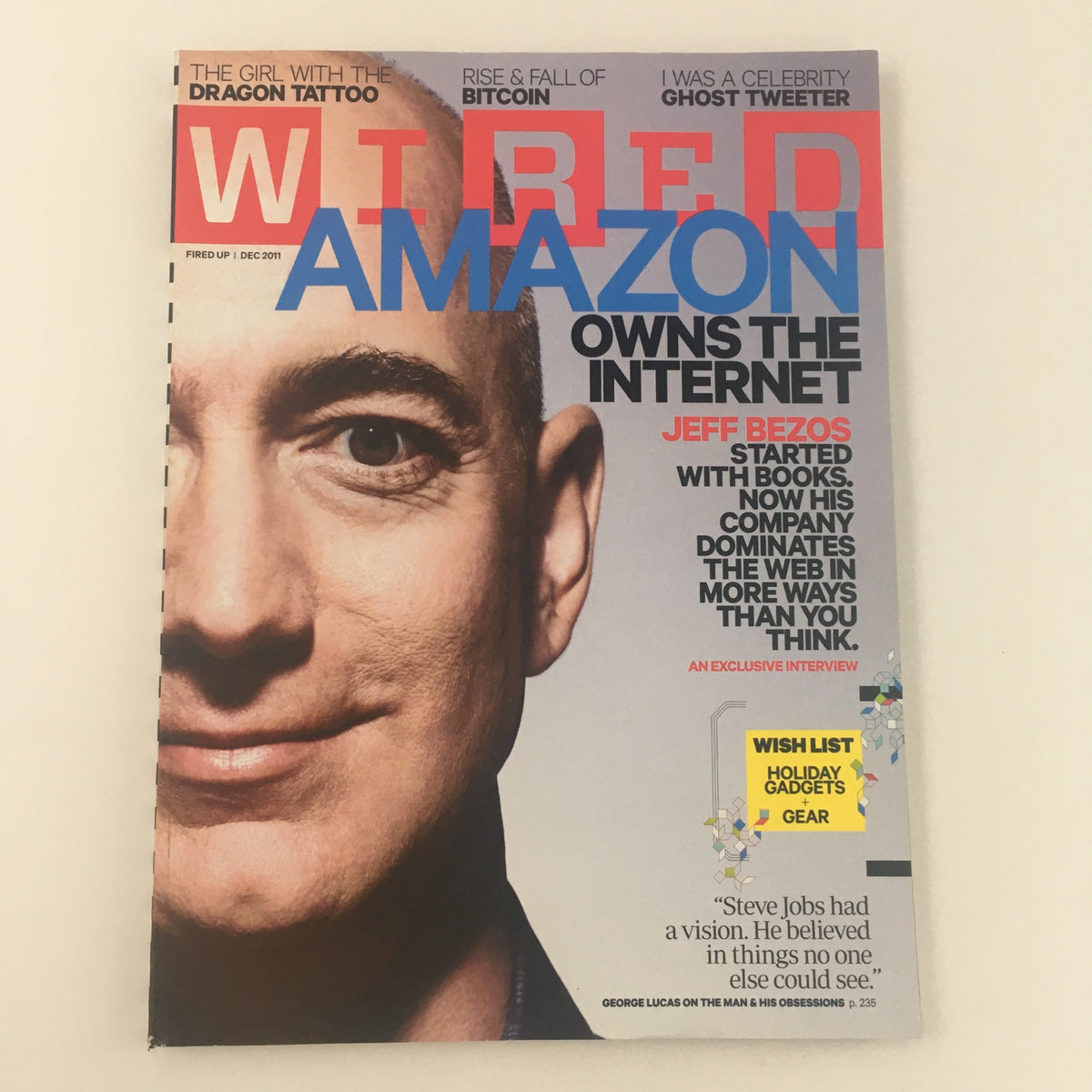 Wired Magazine December 2011 cover featuring Jeff Bezos discussing Amazon's impact on the internet. The magazine highlights Bezos's vision for online dominance and includes articles on technology and consumer culture.
