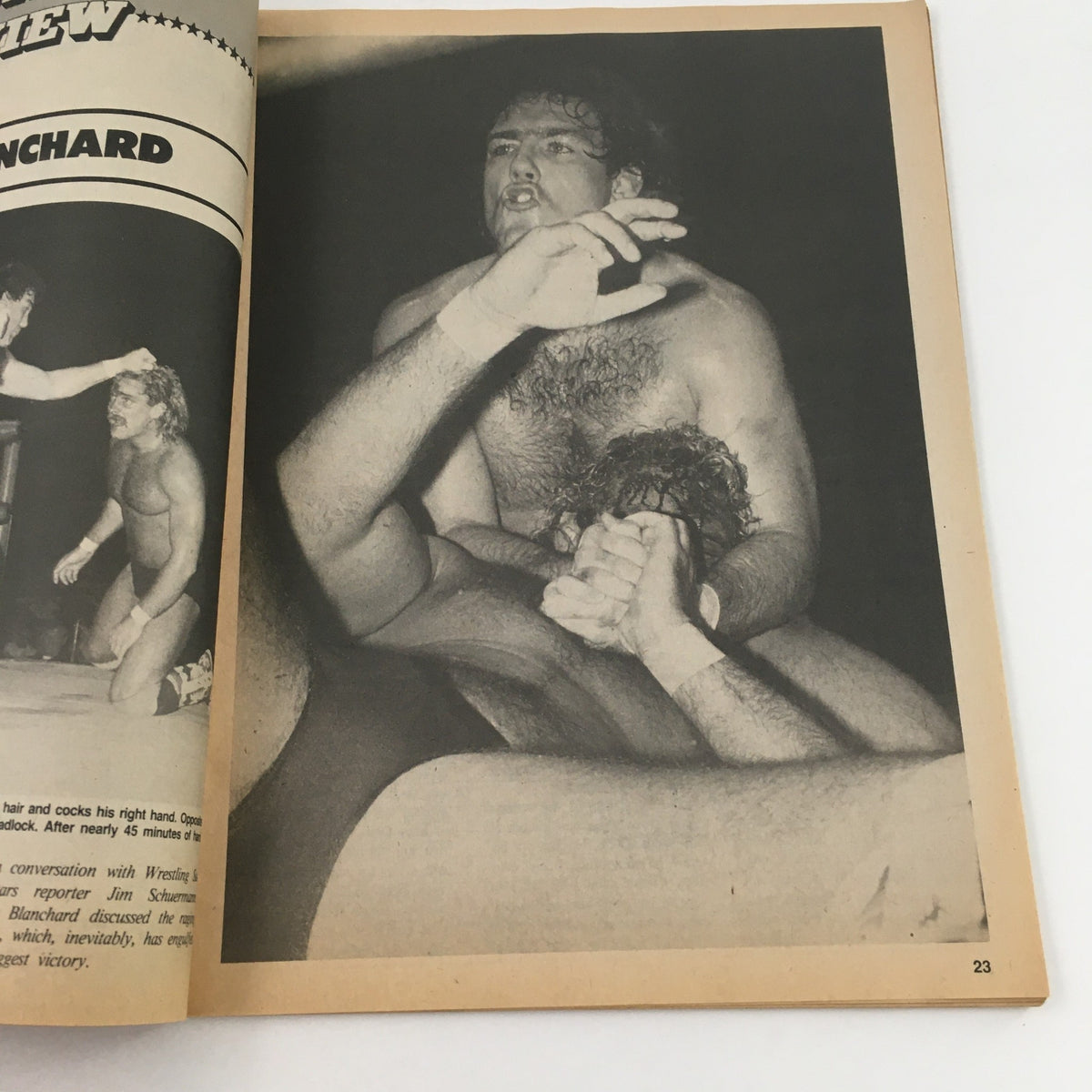 Action shot from Wrestling Superstar Magazine Winter 1985 showing Tully Blanchard engaged in a wrestling match, highlighting the excitement of professional wrestling.