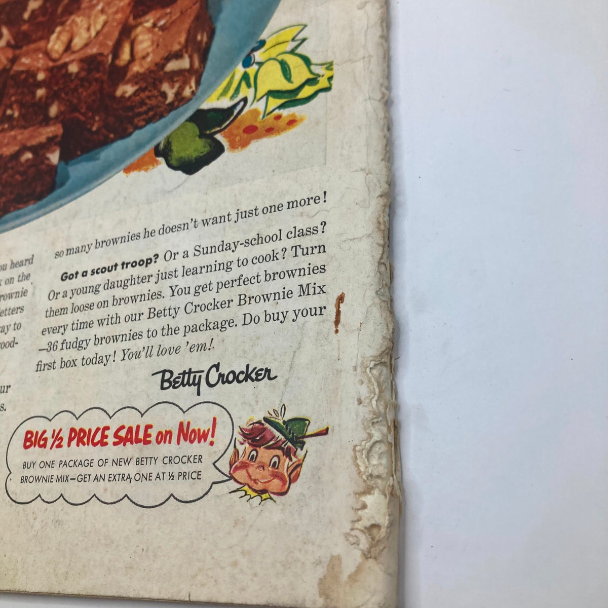 Back cover of the Saturday Evening Post Magazine August 14, 1954 with an advertisement for Betty Crocker Brownie Mix, illustrating nostalgic food marketing.