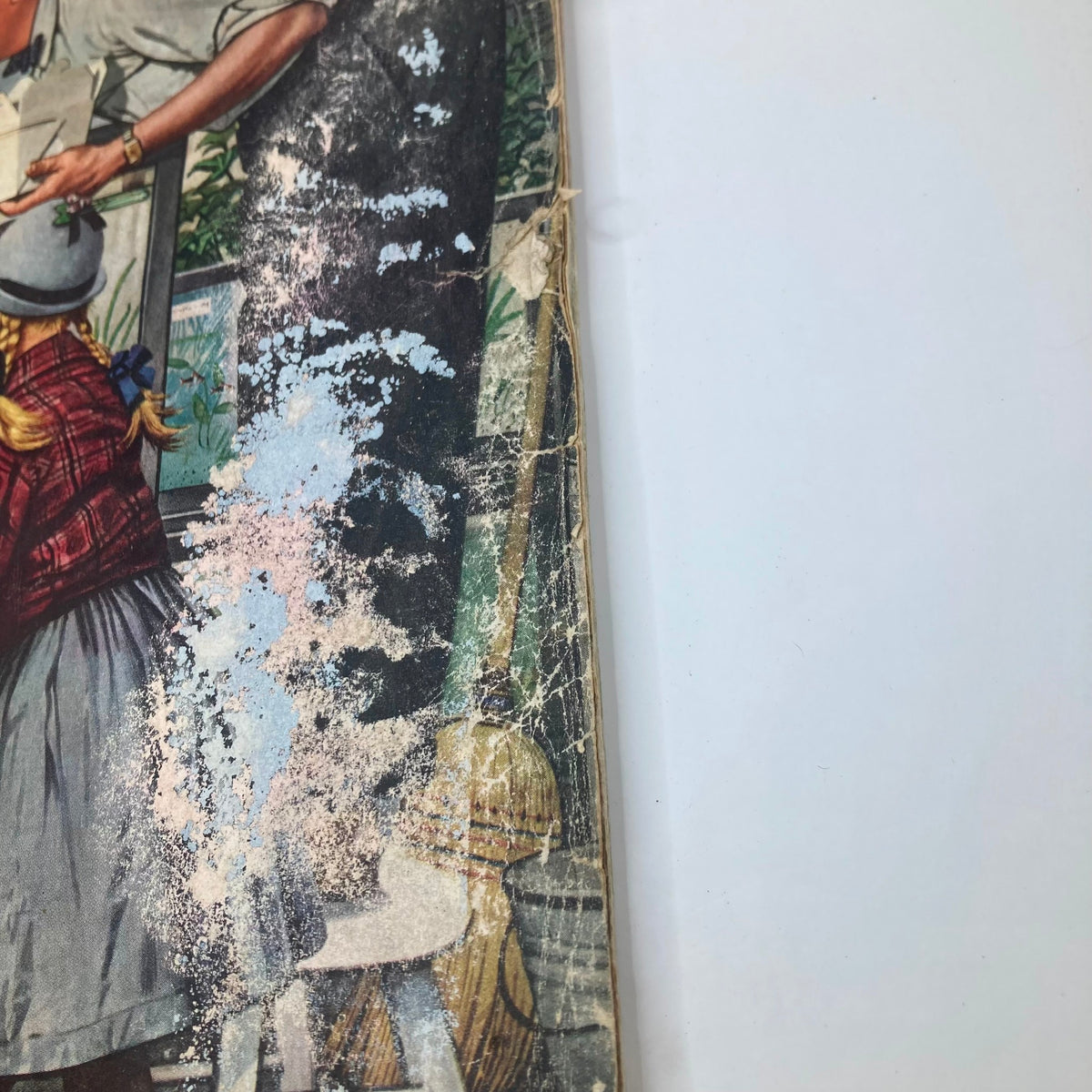 Close-up of the side of the Saturday Evening Post Magazine October 30, 1954 cover, showcasing details of the artwork 'Mr. Fisher' by Stevan Dohanos with visible wear.