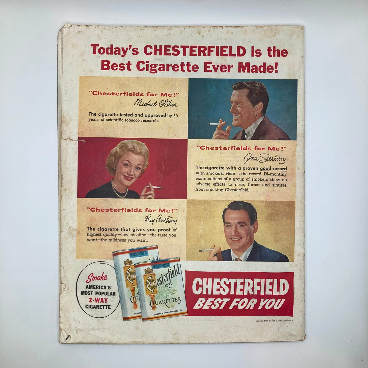 Back cover of the Saturday Evening Post Magazine May 22 1954 featuring a vintage cigarette advertisement for Chesterfield, highlighting popular figures and branding in 1950s advertising.