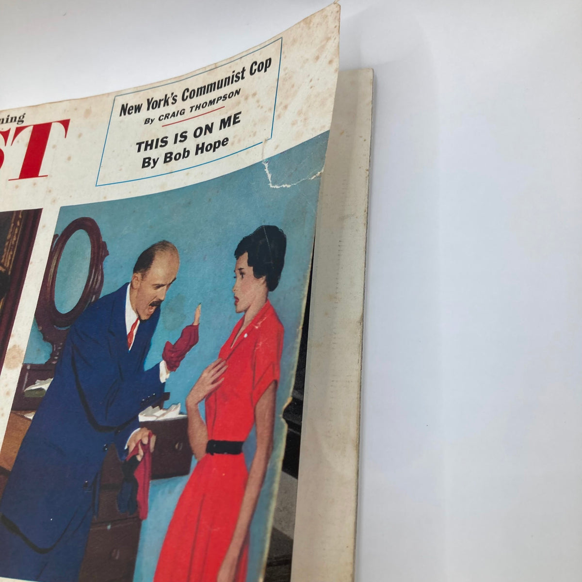 Close-up view of the Saturday Evening Post Magazine cover from March 20, 1954, showing detailed artwork and text related to its content.
