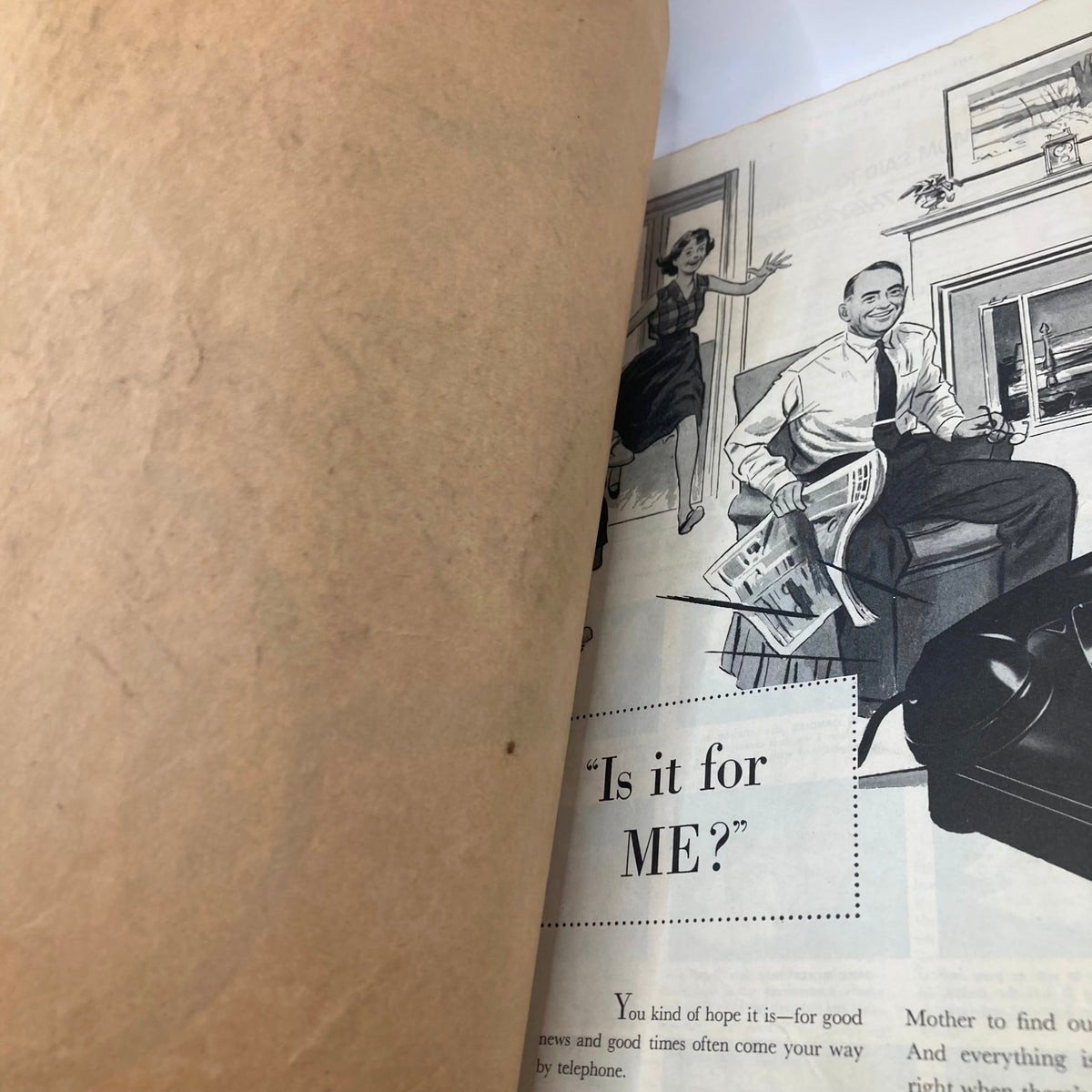 Inside page of Saturday Evening Post Magazine, June 12, 1954. The page features a classic illustration with the caption 'Is it for ME?' depicting a man reading a newspaper as a woman joyfully enters the room.