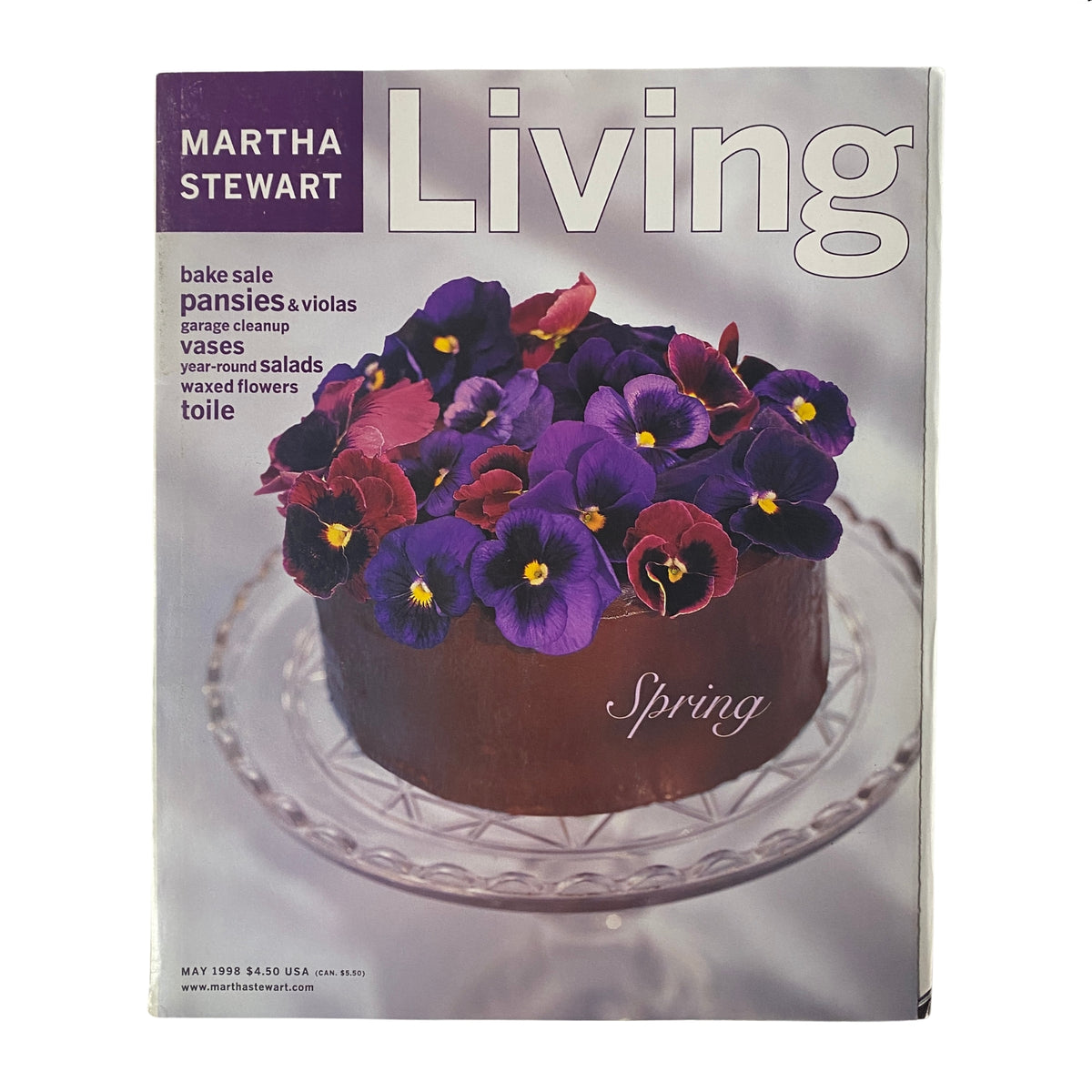 Martha Stewart Living Magazine May 1998 cover featuring a chocolate layer cake adorned with fresh spring pansies and vibrant decorations.