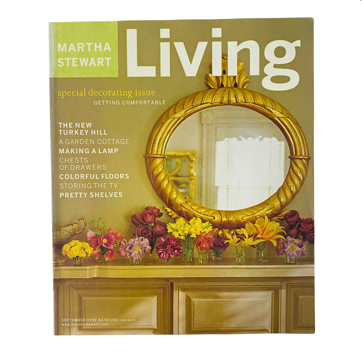 Cover of Martha Stewart Living Magazine September 1999 Decorating Issue featuring a golden mirror and vibrant flower arrangements, showcasing home decor inspiration.
