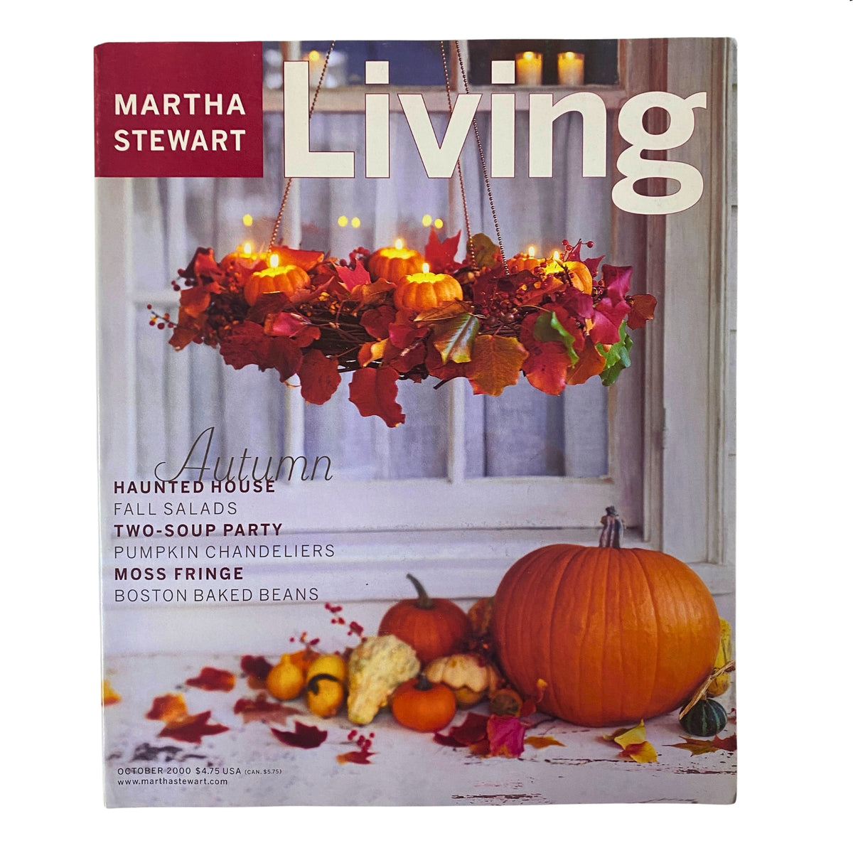 Martha Stewart Living Magazine October 2000 cover featuring autumn-themed decor with pumpkins and a floral chandelier. Highlights the issue's focus on Halloween, fall salads, and signature recipes like Boston Baked Beans.