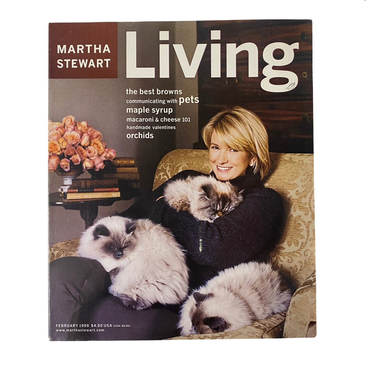 Cover of Martha Stewart Living Magazine February 1999 featuring Martha Stewart with her Himalayans, Teeny, Weeny, and Mozart, showcasing cozy winter themes and elegant home décor ideas.