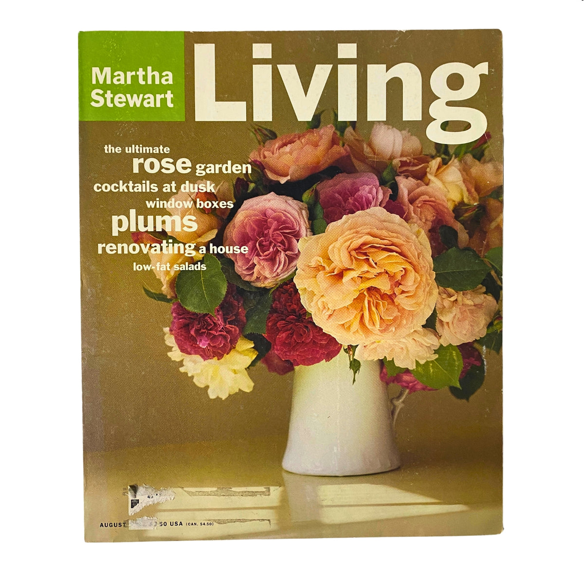 Cover of Martha Stewart Living Magazine August 1994 featuring the title 'The Ultimate Rose Garden' with a vibrant floral arrangement, showcasing roses and other flowers in a white vase, highlighting themes such as gardening, cocktails, and home renovation.