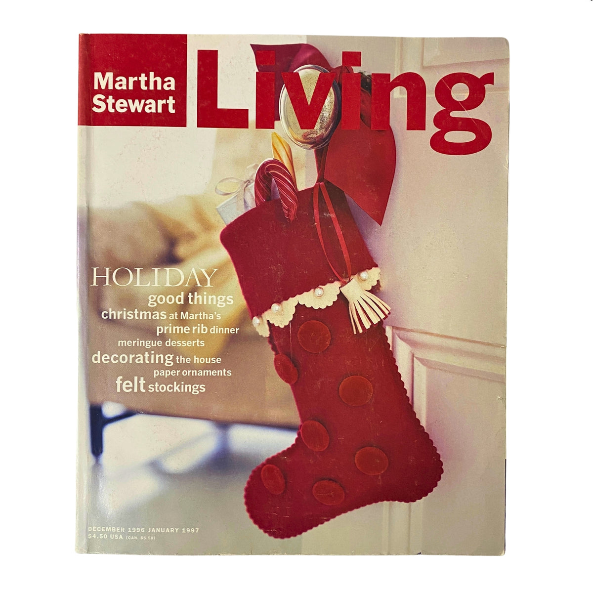 Cover of Martha Stewart Living Magazine December 1996, featuring a festive red felt stocking adorned with decorations, highlighting the theme of 'Christmas at Martha's'. The magazine includes topics on holiday cooking, decorating, and DIY projects.