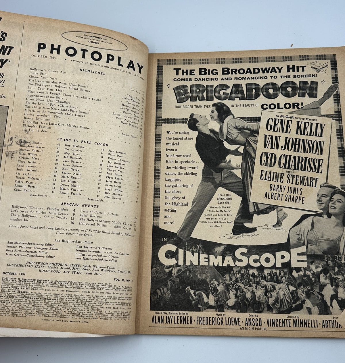 Inside page of Photoplay Magazine October 1954 showing a double-page spread promoting the film 'Singin' in the Rain' with Gene Kelly.