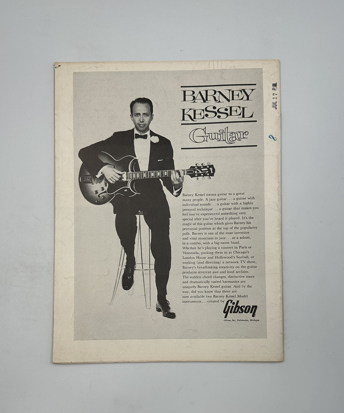 Back cover of Down Beat Magazine August 1, 1963 featuring Barney Kessel with a guitar advertisement.