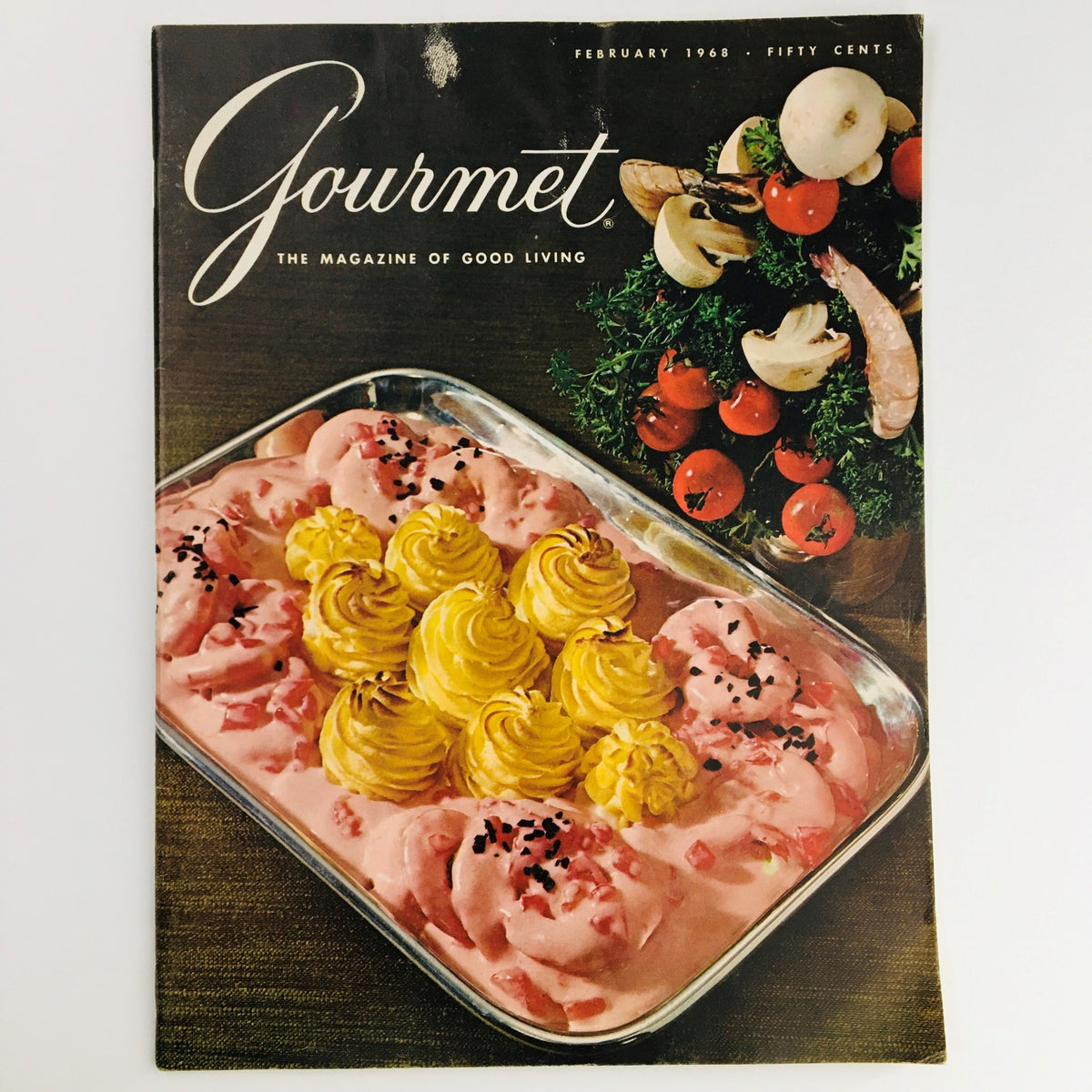 Gourmet Magazine of Good Living, February 1968, featuring a colorful dish with pink mousse and decorative yellow rosettes on the cover, showcasing culinary trends and shrimp-related cuisine.