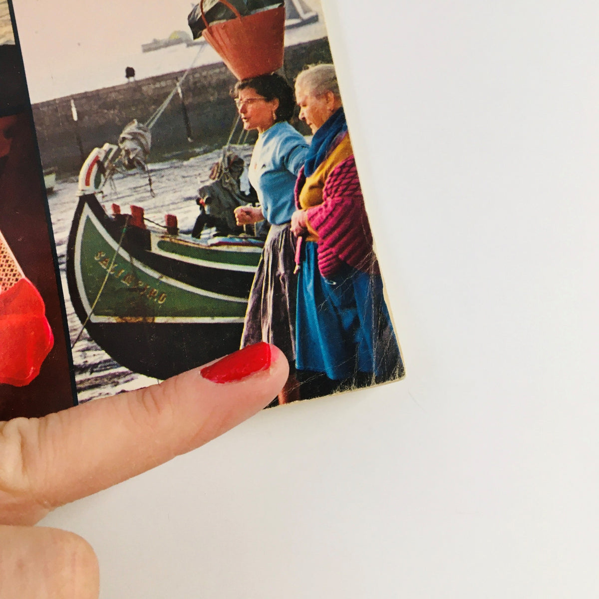 Gourmet Magazine of Good Living March 1969 featuring a vintage photograph of women near boats, highlighting culinary culture and lifestyle from the 1960s.