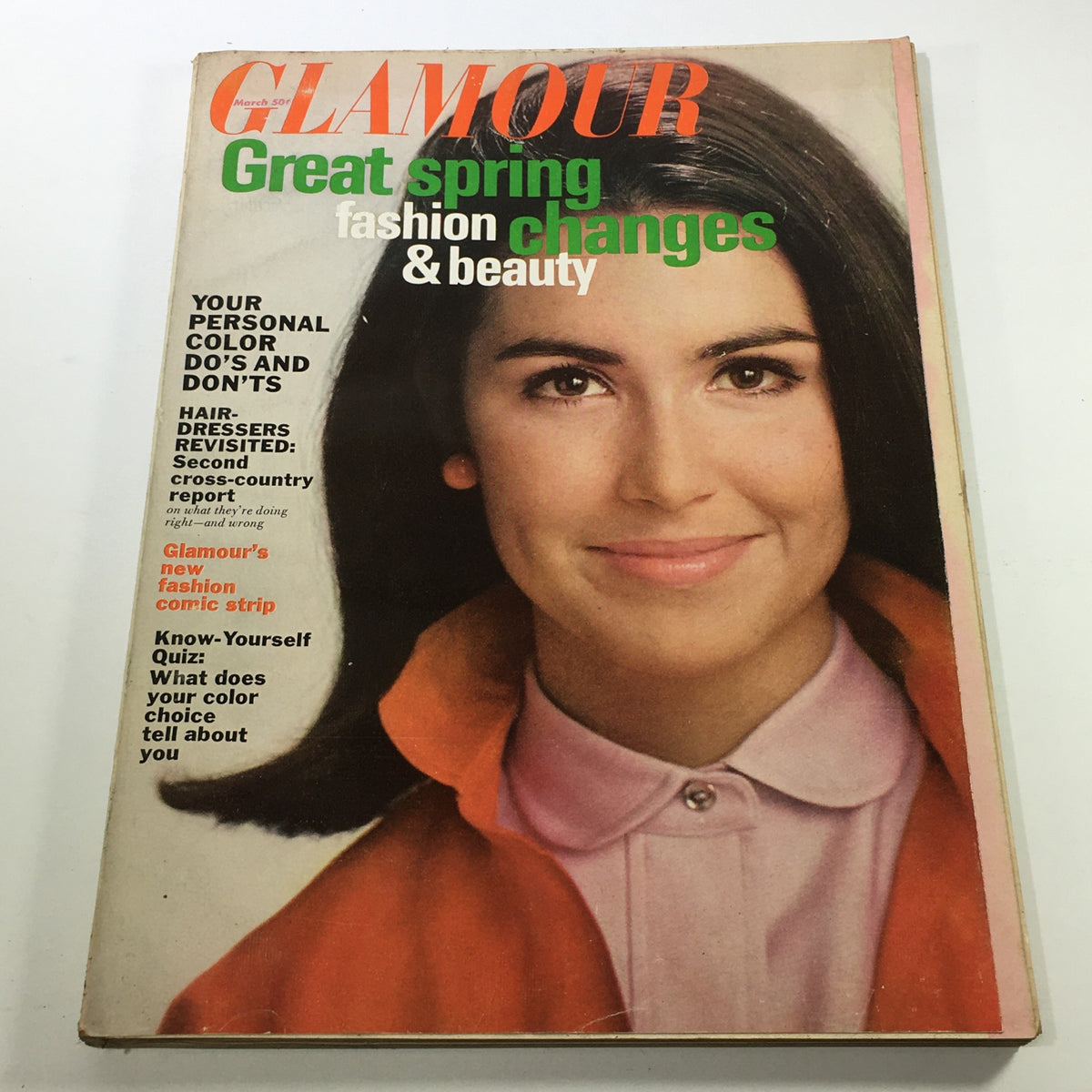 Cover of VTG Glamour Magazine: March 1966 featuring the headline 'Great Spring Fashion Changes' with a focus on beauty and personal color tips. The cover showcases a model smiling, dressed in a colorful outfit, representing 1960s fashion trends.