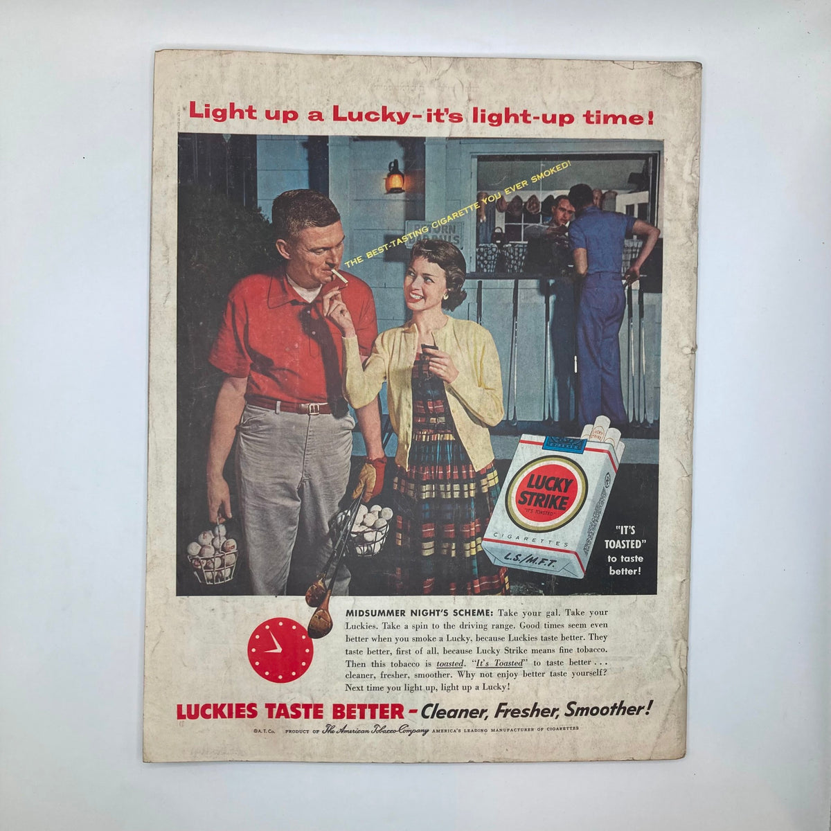 Back cover of the Saturday Evening Post Magazine from September 17, 1955, showcasing a vintage advertisement for Lucky Strike cigarettes, highlighting a couple enjoying a light moment together, reflective of the era's marketing style.