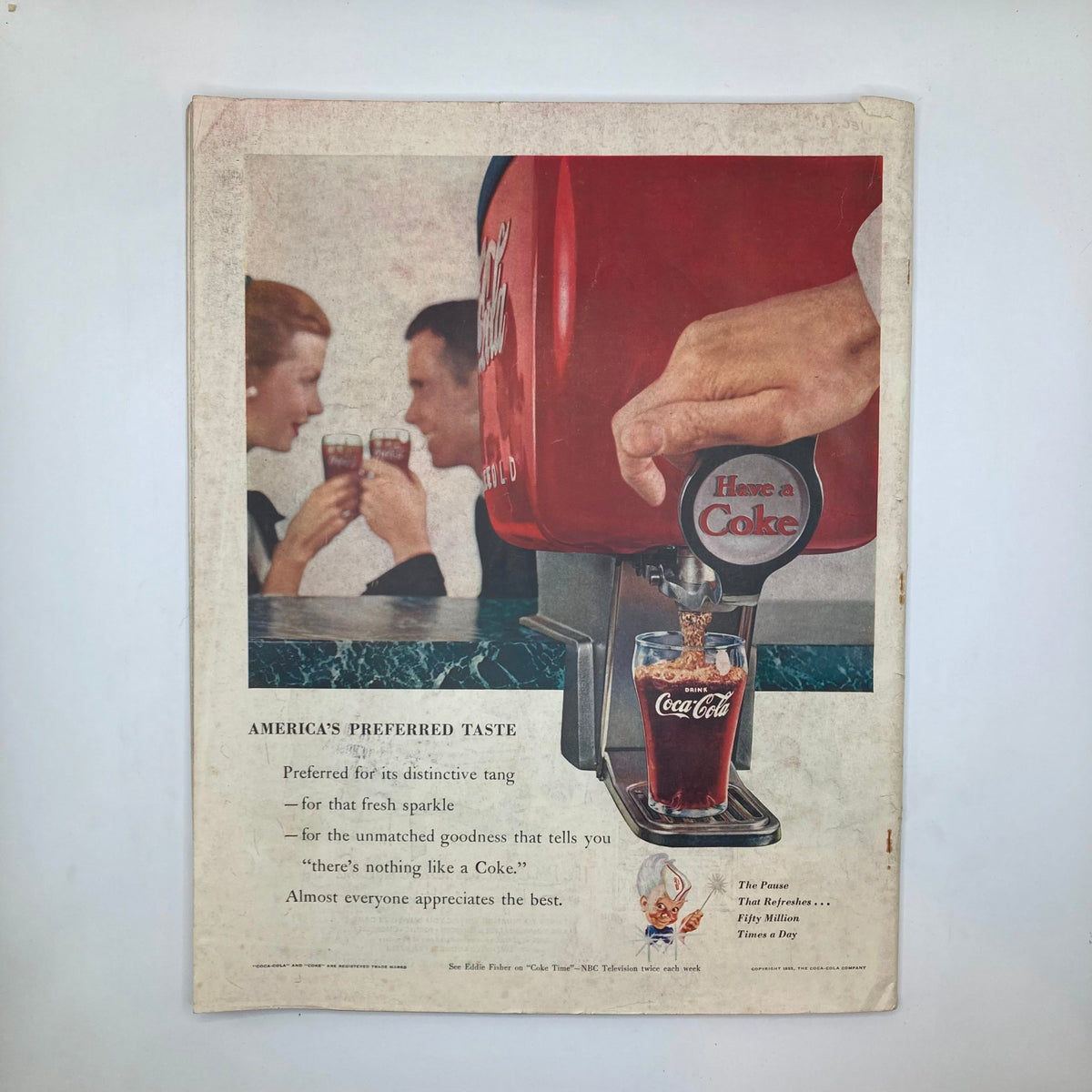 Back cover of Saturday Evening Post Magazine from November 26, 1955, featuring a vintage Coca-Cola advertisement with two people enjoying drinks, highlighting the cultural nostalgia of the era.
