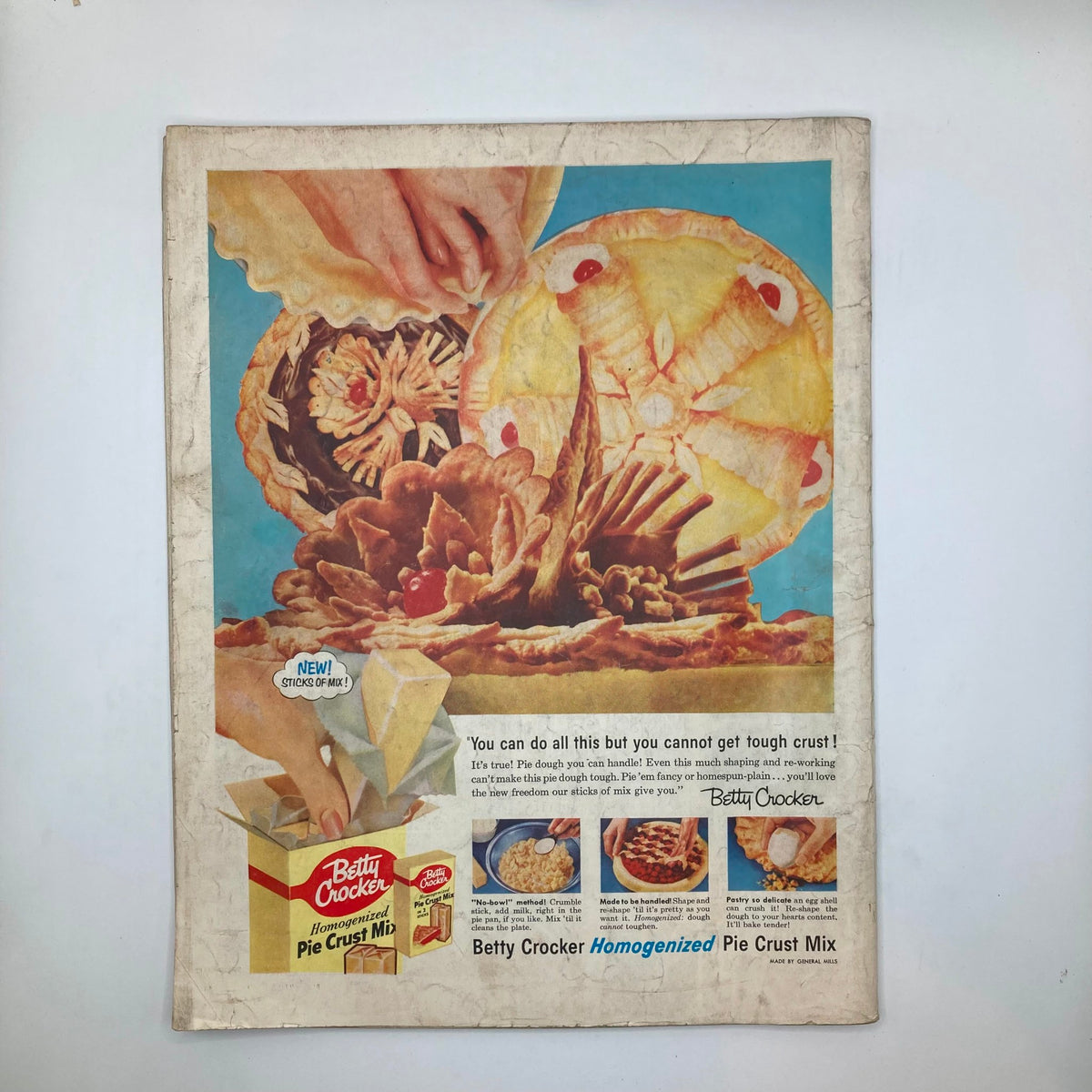 Back cover of the Saturday Evening Post magazine from June 18, 1955, displaying a vintage advertisement for Betty Crocker Homogenized Pie Crust Mix with a hand preparing a pie.