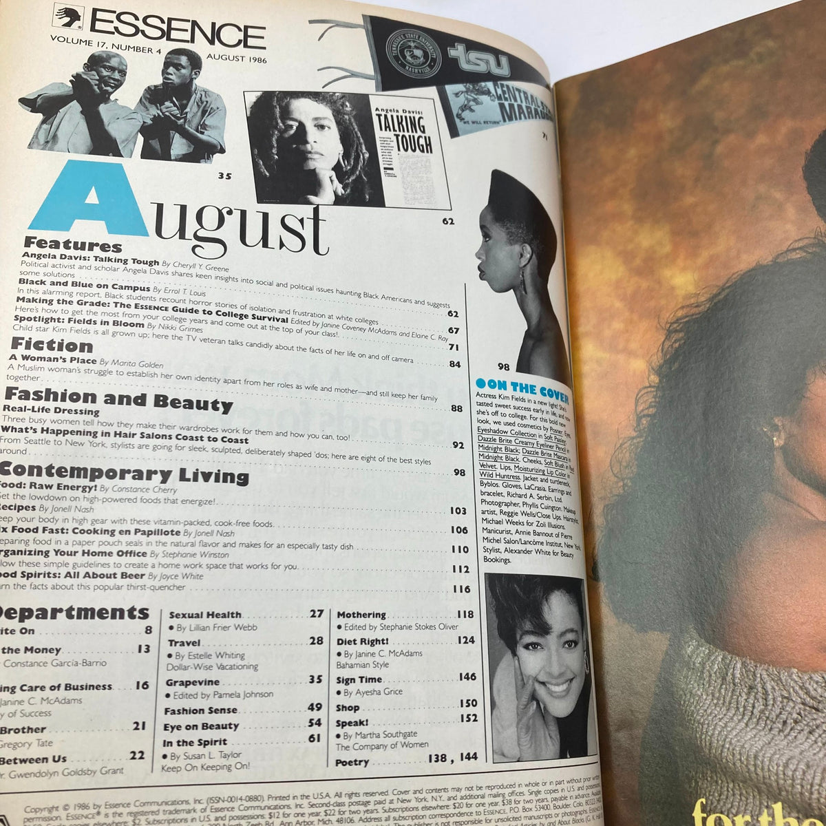 Interior page of Essence Magazine August 1986, Volume 17, Number 4, highlighting articles including Angela Davis and a column on hairstyle trends, alongside a small photo of Kim Fields.